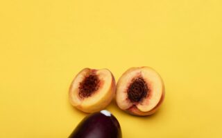 sliced fruit on yellow surface