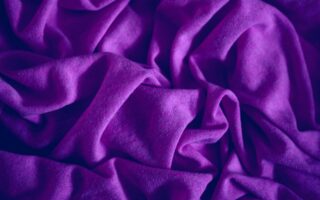 red textile in close up photography